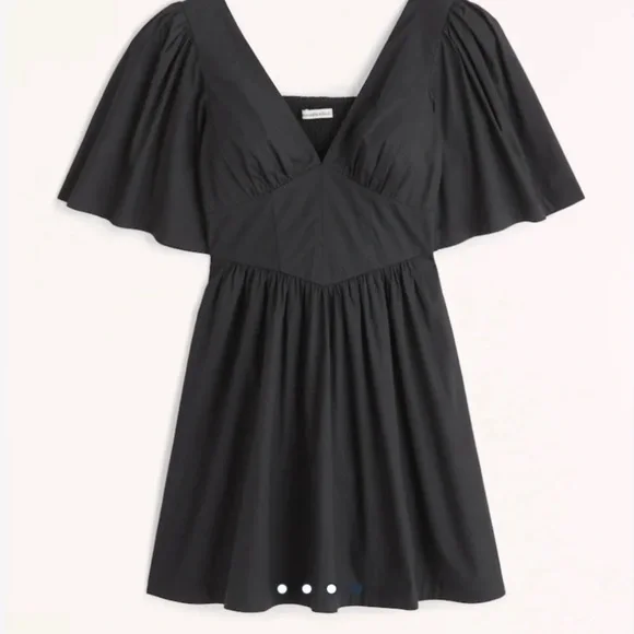 a dress to match my black heart Heart Cut Out Long Sleeve Mini Dress in Black - 2